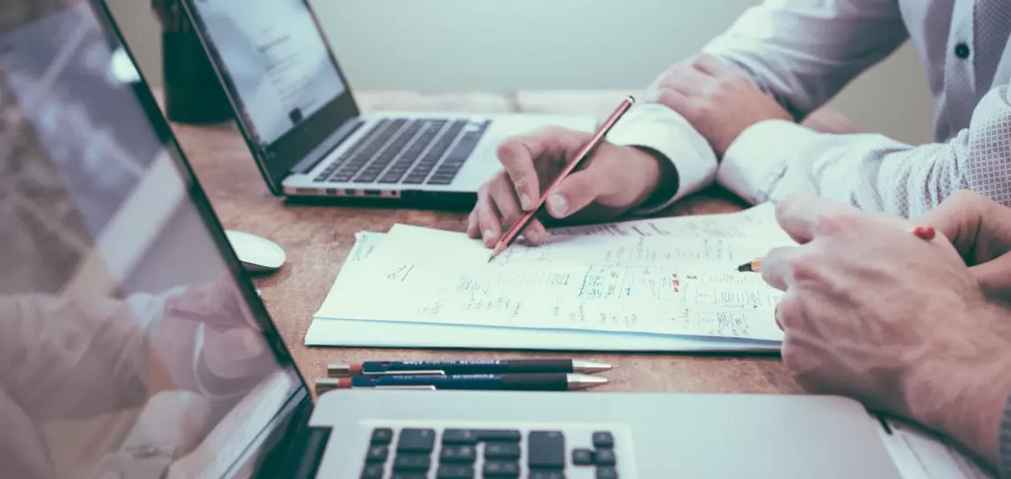 The Pros & Cons of Hiring a Tax Agent vs. Doing Your Own Taxes